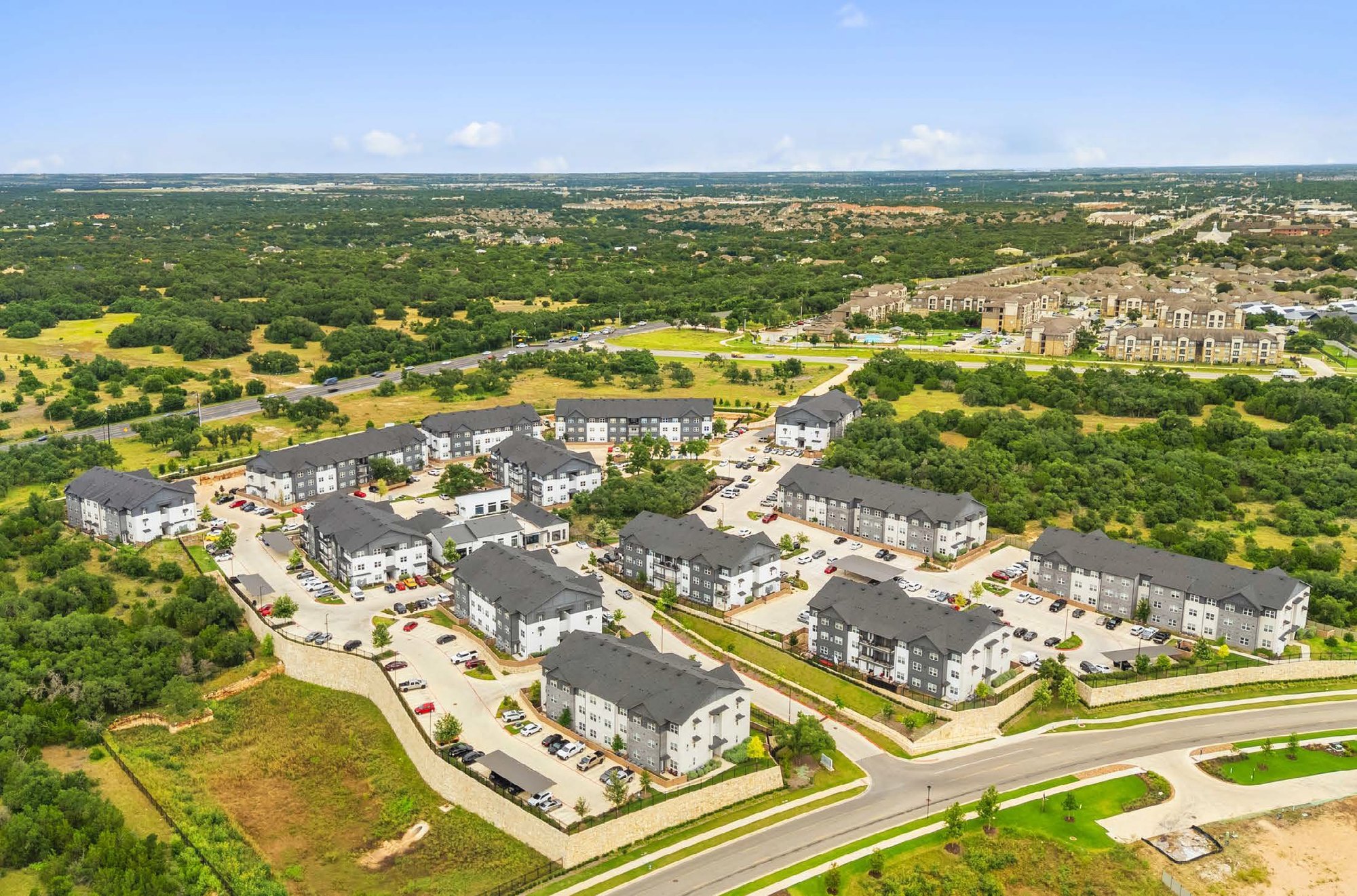 Aerial view of a newly built Class A garden apartment community